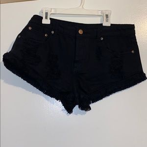 Black distressed denim short shorts